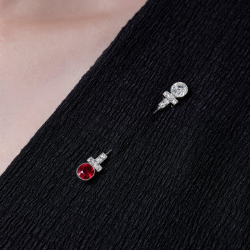 A Thai Ruby and Diamond Pin Brooch by Cartier